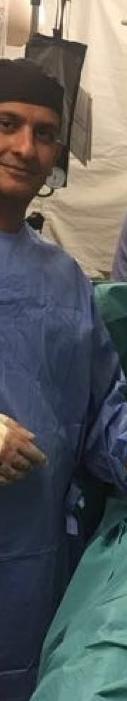 Professor Khan in a deployed operating tent