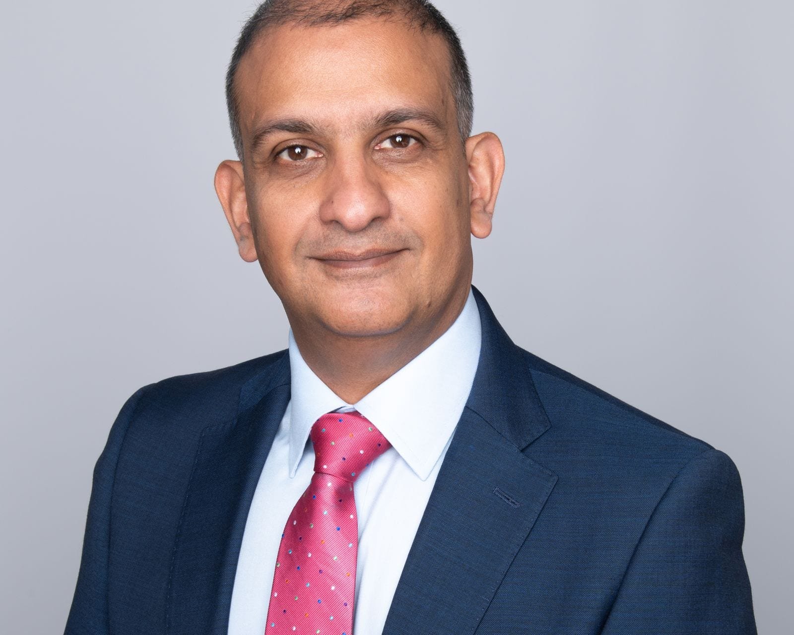 Official studio portrait of Professor Mansoor Khan